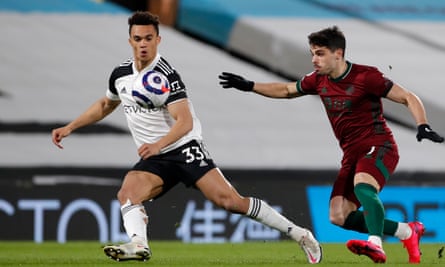 Antonee Robinson gets clear of Wolves’ Pedro Neto