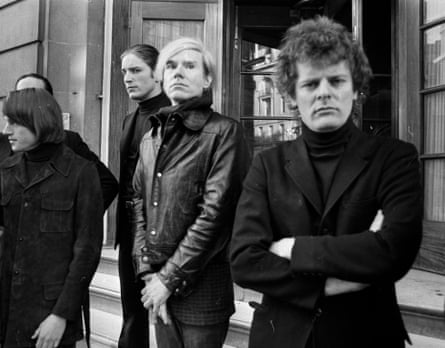 Actors (left to right) Jed Johnson and Joe Dallesandro, Andy Warhol and Paul Morrissey stand outside the Ritz Hotel in London