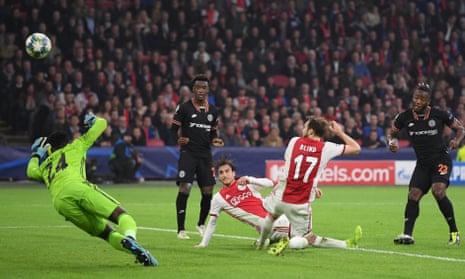Chelsea’s Michy Batshuayi (right) turns home the only goal of the game at Ajax.