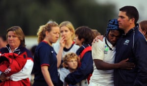 England’s Maggie Alphonsi (second right) is consoled by a coach at the end of the 2010 Rugby World Cup final.