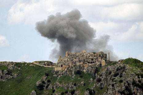 Smoke rises behind the 12th century Crusader-era Beaufort (Belfort) Castle.