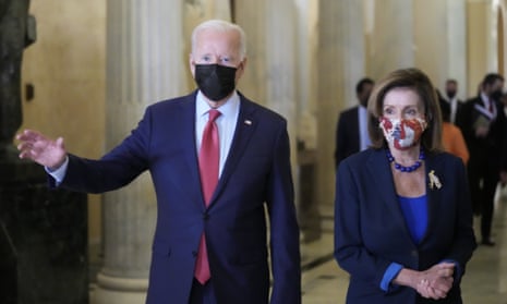 Joe Biden and Nancy Pelosi emerge from talks with the House Democratic Caucus on Friday.