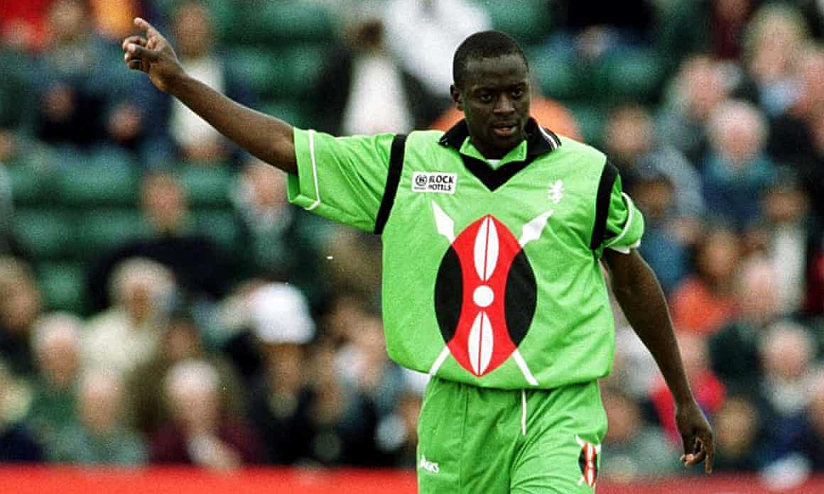 Martin Suji celebrates a wicket for Kenya at the 1999 World Cup shirt, wearing their bright green shirt with Maasai shield.