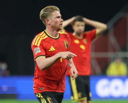 Kevin De Bruyne celebrates after scoring one of his two goals for Belgium in Liège.
