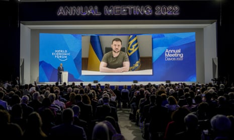 The Ukrainian president, Volodymyr Zelenskiy, makes an address from Kyiv to an audience at the World Economic Forum in Davos, Switzerland.