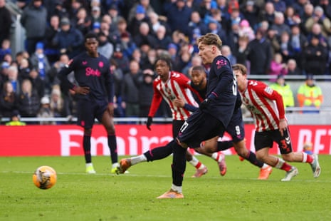 Everton's James Garner scores their equaliser from the penalty spot.