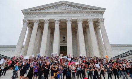 Protesters on the steps outside the supreme court, after the Senate voted to confirm Brett Kavanaugh.