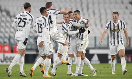 Cristiano Ronaldo celebrates with teammates after scoring Juventus’s second goal against Cagliari