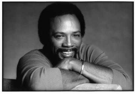The Long Wave: Is Kemi Badenoch’s victory a win to Nigerians? Black-and-white image of Quincy Jones smiling with his arms folded, taken in 1981