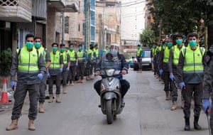 Beirut, Lebanon: volunteers from Hezbollah’s Islamic health unit gather to sanitise streets