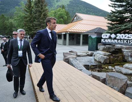 French President Emmanuel Macron arrives to speak to the press during the Group of Seven (G7) Summit at the Pomeroy Kananaskis Mountain Lodge in Kananaskis, Alberta, Canada today.