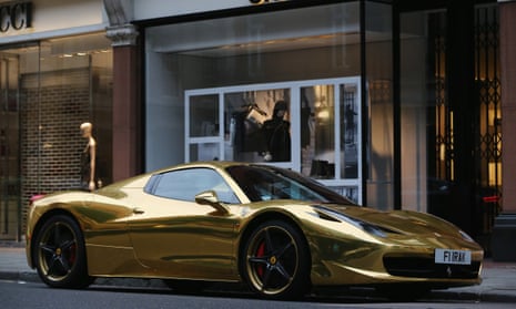A gold Ferrari parked in Sloane Street in London
