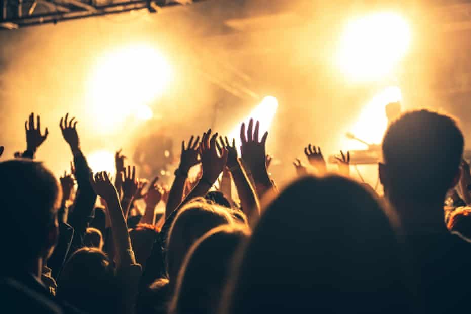 Silhouetted crowd in a club