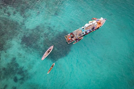 Aerial image of a Bajau family living on a traditional lansa houseboat