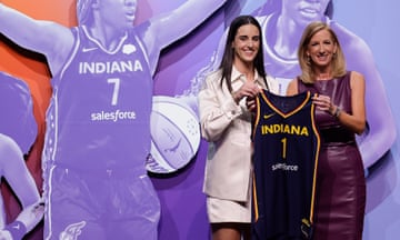 Iowa’s Caitlin Clark, left, poses with WNBA commissioner Cathy Engelbert after getting selected by the Indiana Fever with the No 1 overall pick in the WNBA draft on Monday night in Brooklyn.