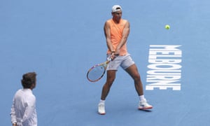 Spain’s Rafael Nadal makes a backhand on Sunday as coach Francis Roig watches during practice session ahead of the Australian Open in Melbourne.