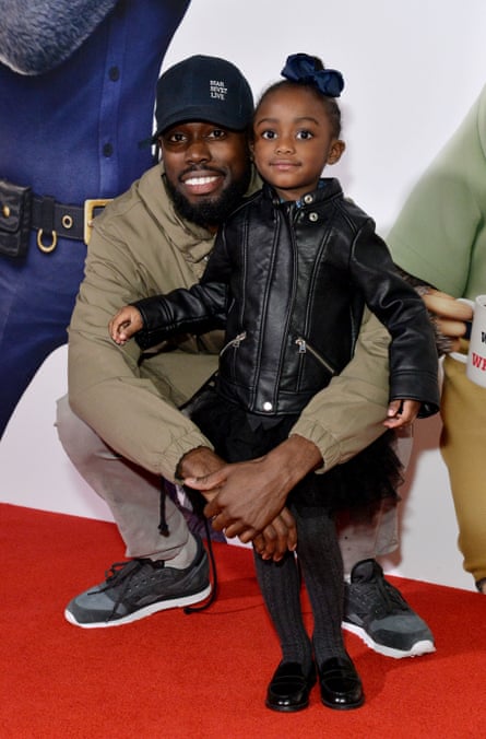 Ghetts with his daughter in 2016.