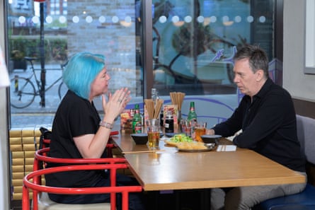 Cushla and Martin chat across a restaurant table