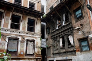 Modern building squeezed between traditional building in Kathmandu, Nepal