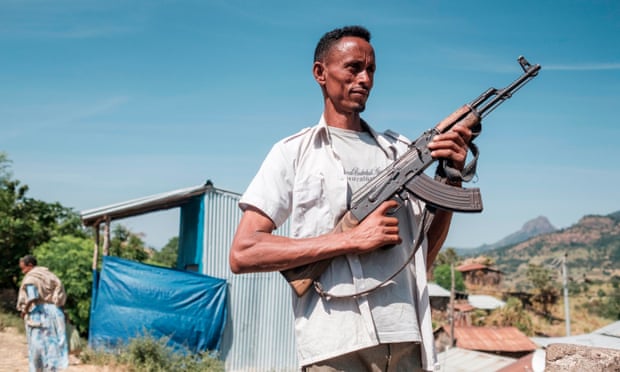 A militiaman poses for a photograph in the town of Musebamb in Amhara province