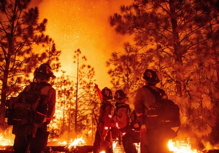 CalFire placer crew firefighters monitor a backfire during the Mosquito fire in September 2022.