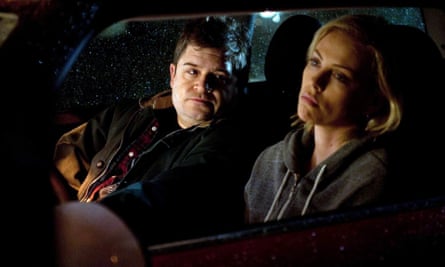 Patton Oswalt, left, with Charlize Theron in Young Adult.