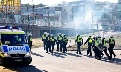 Anti-riot police in Norrkoping, Sweden on Sunday