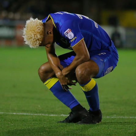 Despair for AFC’s Lyle Taylor after he missed the penalty in the 2nd half