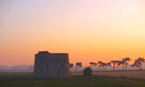Sunset behind a Martello tower, Bawdsey, Suffolk.