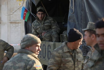 Azerbaijani service members gather in Aghdam, Karabakh, in 2020.