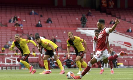 Pierre-Emerick Aubameyang scores from the penalty spot for Arsenal against Watford.