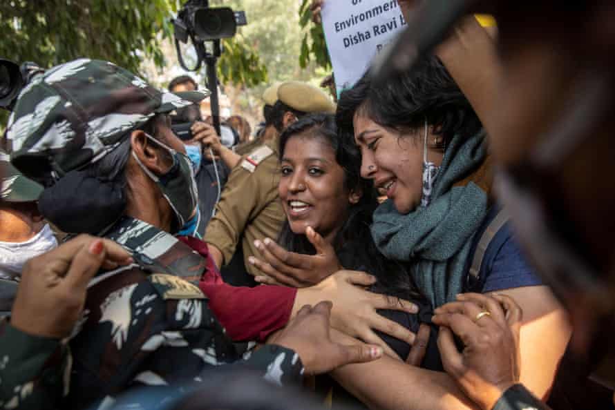 Agency photographer of the year – 2021 shortlist | World news 27 Demonstrators are stopped by police during a protest against the arrest of 22-year-old climate activist Disha Ravi, outside the police headquarters in New Delhi, India, February 16