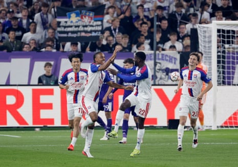 Olympique Lyonnais' Noah Nartey celebrates scoring their first goal with Clinton Mata.