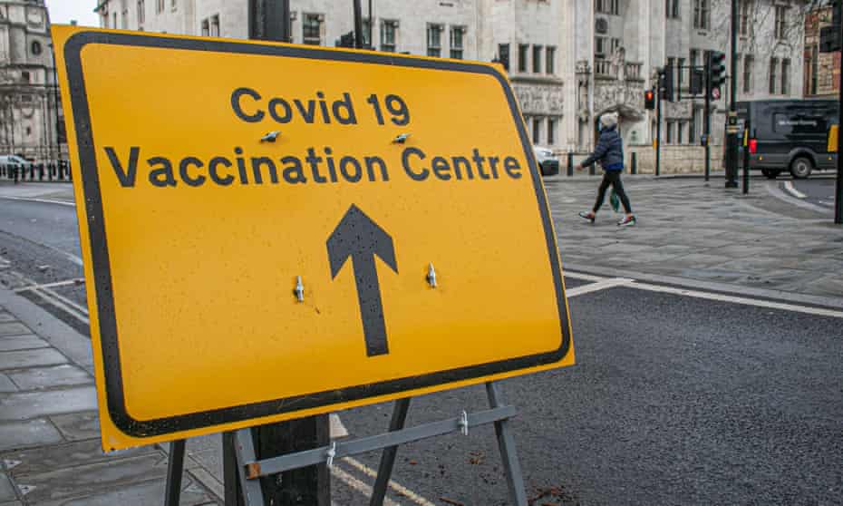 A sign pointing the way to a Covid-19 vaccination centre in London