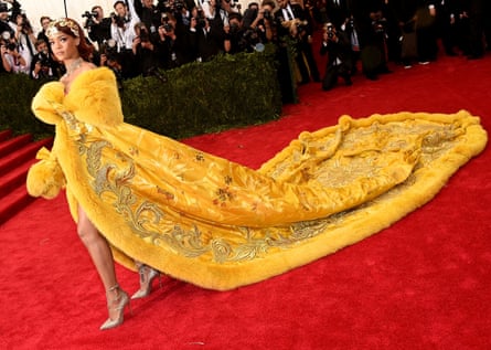 Rihanna in a long flowing yellow gown in 2015 at the Met Gala