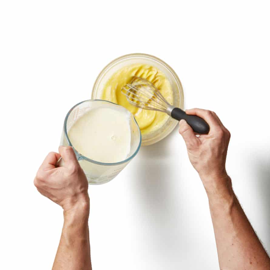 whisk together the whole eggs, egg yolks and sugar in a large heatproof bowl