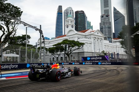 Max Verstappen turns his RB21 into a corner at the Marina Bay Street Circuit during a practice session ahead of the Singapore Grand Prix.
