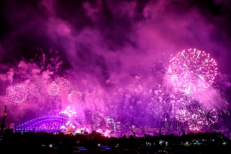 Fireworks explode over the Sydney Harbour Bridge and Sydney Opera House during New Year’s Eve celebrations.