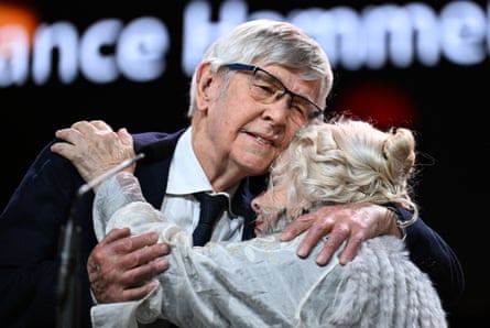 Tom Courtenay and Anna Calder-Marshall hug as they accept the Silver Bear for best supporting performance at the Berlinale film festival.