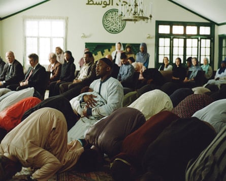 Man in mosque praying