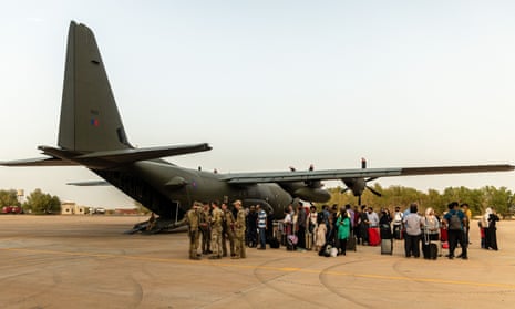 British Nationals about to board an RAF aircraft at RAF Akrotiri in Cyprus, after being evacuated from Sudan. 