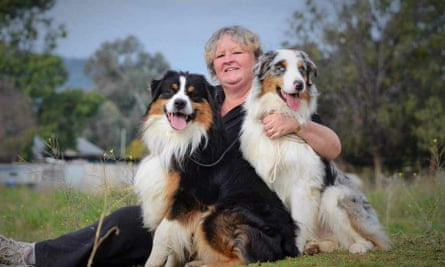 Paulene Andrews with two of her Australian shepherds