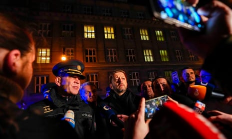 Czech Republic’s Minister of the Interior Vit Rakušan, center, and Police officer Martin Vondrášek, left, speak to the media after a mass shooting in downtown Prague, Czech Republic, Thursday, Dec. 21, 2023.