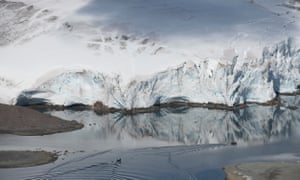 Greenpeace inflatables explore one of the South Shetland Islands.