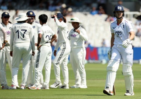 Amy Jones walks back to the pavilion after losing her wicket.