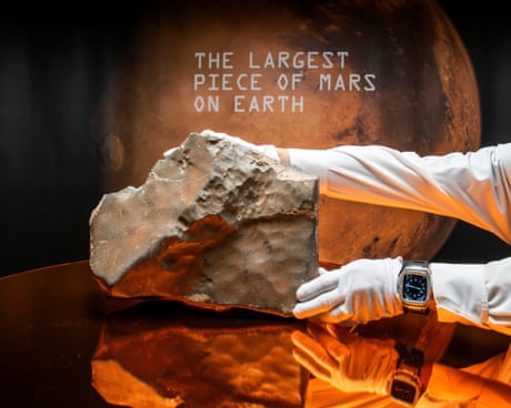 Meteorite NWA 16788 is displayed at Sotheby’s auction in New York<br>A handler organizes meteorite NWA 16788, the largest known piece of Mars on Earth, during the press preview of Sotheby’s Natural History auction in New York City, U.S., July 8, 2025. REUTERS/Eduardo Munoz