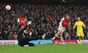 Arsenal’s Martin Odegaard is denied by the arm of Alisson.