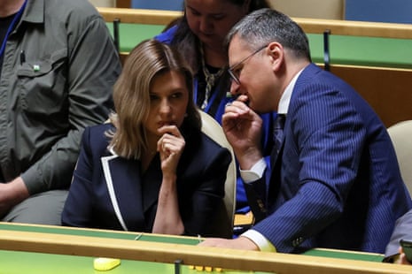 Olena Zelenska, wife of Ukraine’s President Volodymyr Zelenskiy, sits wth Ukrainian Foreign Minister Dmytro Kuleba.