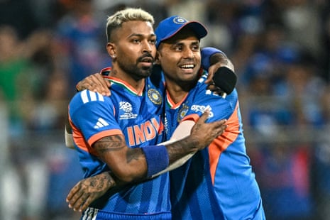 Hardik Pandya celebrates with his captain Suryakumar Yadav after taking the wicket of Phil Salt.