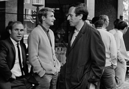 Brian Glanville (third left) waits outside a hotel in Oslo before England’s 1966 friendly with Norway alongside players including Ray Wilson (left) and Roger Hunt (second left)